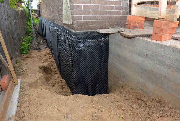 SJ Waterproofing Pros technician performing targeted Foundation Crack Repair assessment in Wilson, NY
